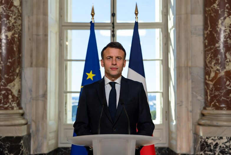 European Leader at Podium, Refusing U.S. Military Framework, May 2026.